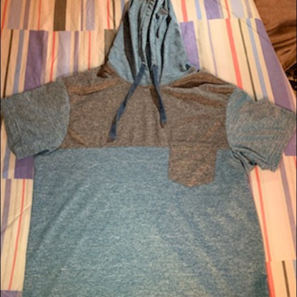 This is a raw yarn shirt with a hood